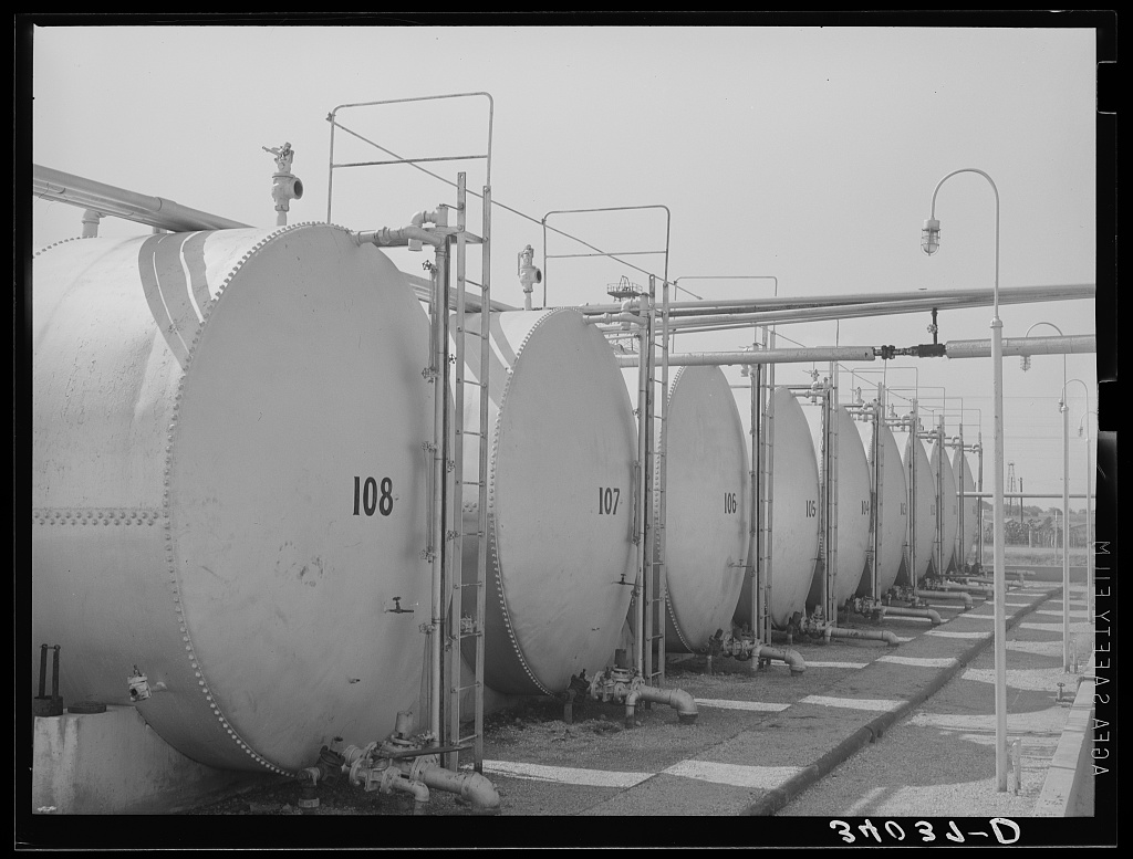 Crude oil storage tanks, Seminole, Oklahoma, 1939. Russell Lee, Farm Security Administration.